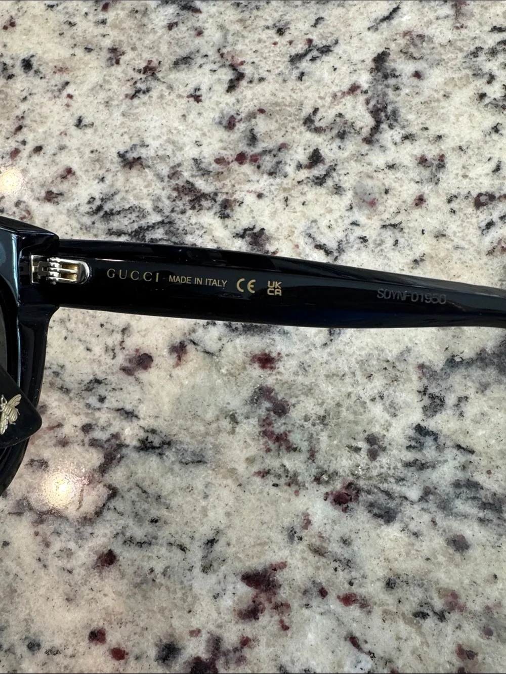 Gucci Black Sunglasses with Gold Logo and Crystal Star Accents